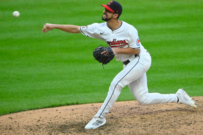 May 6, 2024; Cleveland, Ohio, USA; Cleveland Guardians relief pitcher Nick Sandlin (52) delivers a pitch in the seventh inning against the Detroit Tigers at Progressive Field. Mandatory Credit: David Richard-USA TODAY Sports
