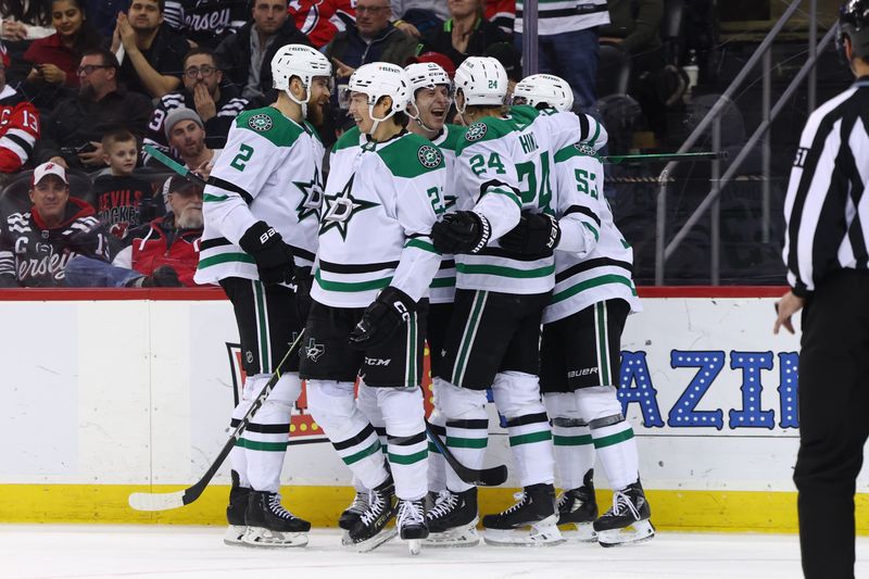 Jan 20, 2024; Newark, New Jersey, USA; Dallas Stars center Wyatt Johnston (53) celebrates his goal against the New Jersey Devils during the third period at Prudential Center. Mandatory Credit: Ed Mulholland-USA TODAY Sports