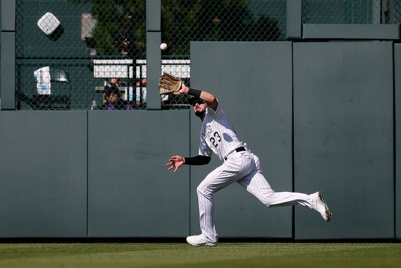 Jul 16, 2023; Denver, Colorado, USA; Colorado Rockies right fielder Kris Bryant (23) makes a catch for an out in the eleventh inning against the New York Yankees at Coors Field. Mandatory Credit: Isaiah J. Downing-USA TODAY Sports