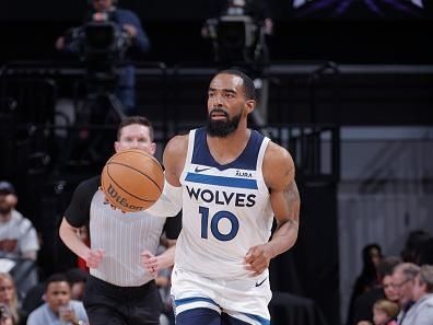 SACRAMENTO, CA - DECEMBER 23: Mike Conley #10 of the Minnesota Timberwolves brings the ball up court against the Sacramento Kings on December 23, 2023 at Golden 1 Center in Sacramento, California. NOTE TO USER: User expressly acknowledges and agrees that, by downloading and or using this Photograph, user is consenting to the terms and conditions of the Getty Images License Agreement. Mandatory Copyright Notice: Copyright 2023 NBAE (Photo by Rocky Widner/NBAE via Getty Images)