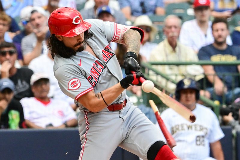 Aug 11, 2024; Milwaukee, Wisconsin, USA;  Cincinnati Reds designated hitter Jonathan India (6) breaks his bat while grounding out in the seventh inning against the Milwaukee Brewers at American Family Field. Mandatory Credit: Benny Sieu-USA TODAY Sports