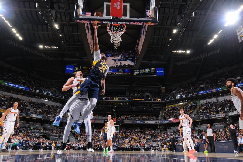 INDIANAPOLIS, IN - FEBRUARY 24:  Myles Turner #33 of the Indiana Pacers drives to the basket during the game against the Denver Nuggets on February 24, 2025 at Gainbridge Fieldhouse in Indianapolis, Indiana. NOTE TO USER: User expressly acknowledges and agrees that, by downloading and or using this Photograph, user is consenting to the terms and conditions of the Getty Images License Agreement. Mandatory Copyright Notice: Copyright 2025 NBAE (Photo by Ron Hoskins/NBAE via Getty Images)