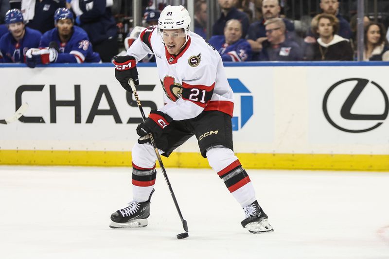 Nov 1, 2024; New York, New York, USA;  Ottawa Senators center Nick Cousins (21) controls the puck in the first period against the New York Rangers at Madison Square Garden. Mandatory Credit: Wendell Cruz-Imagn Images