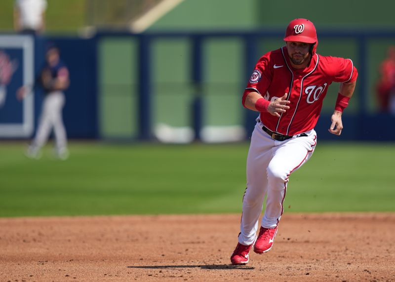 Feb 26, 2023; West Palm Beach, Florida, USA;  Washington Nationals left fielder Lane Thomas (28) heads to third base on a base hit in the third inning against the Houston Astros at The Ballpark of the Palm Beaches. Mandatory Credit: Jim Rassol-USA TODAY Sports