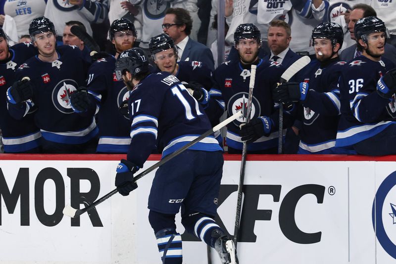 May 9, 2025; Winnipeg, Manitoba, CAN;Winnipeg Jets center Adam Lowry (17) celebrates his goal against the Dallas Stars in the second period in game two of the second round of the 2025 Stanley Cup Playoffs at Canada Life Centre. Mandatory Credit: James Carey Lauder-Imagn Images