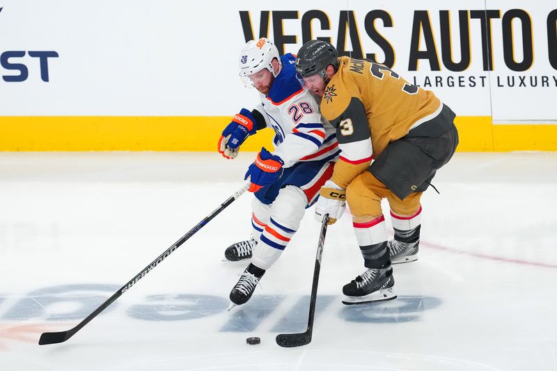 May 6, 2025; Las Vegas, Nevada, USA; Vegas Golden Knights defenseman Brayden McNabb (3) looks to check Edmonton Oilers right wing Connor Brown (28) during the third period of game one of the second round of the 2025 Stanley Cup Playoffs at T-Mobile Arena. Mandatory Credit: Stephen R. Sylvanie-Imagn Images