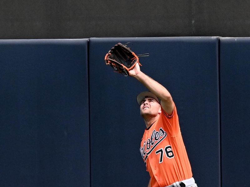 Mar 19, 2023; Tampa, Florida, USA; Baltimore Orioles center fielder Colton Cowser (76) catches a fly ball in the third inning of a spring training game against the New York Yankees at George M. Steinbrenner Field. Mandatory Credit: Jonathan Dyer-USA TODAY Sports