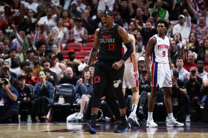 MIAMI, FLORIDA - MARCH 05: Bam Adebayo #13 of the Miami Heat reacts during the third quarter of the game against the Detroit Pistons at Kaseya Center on March 05, 2024 in Miami, Florida. NOTE TO USER: User expressly acknowledges and agrees that, by downloading and or using this photograph, User is consenting to the terms and conditions of the Getty Images License Agreement. (Photo by Megan Briggs/Getty Images)