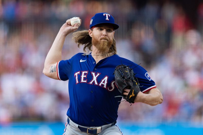 May 21, 2024; Philadelphia, Pennsylvania, USA; Texas Rangers pitcher Jon Gray (22) throws a pitch during the second inning against the Philadelphia Phillies at Citizens Bank Park. Mandatory Credit: Bill Streicher-USA TODAY Sports