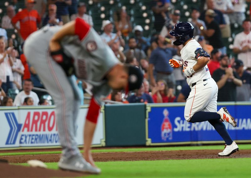 Jul 30, 2025; Houston, Texas, USA; Houston Astros second baseman Jose Altuve (27) rounds the bases after hitting a three run home run against Washington Nationals starting pitcher MacKenzie Gore (1) in the second inning at Daikin Park. Mandatory Credit: Thomas Shea-Imagn Images
