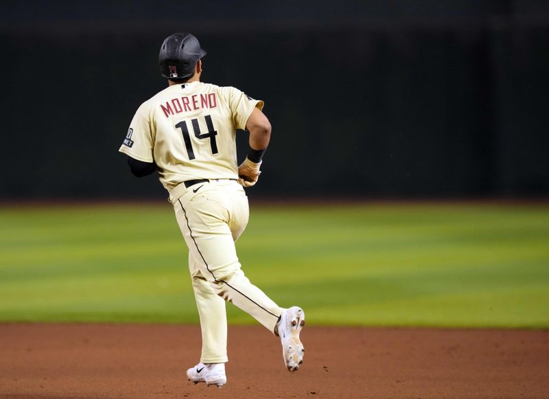 Sep 2, 2023; Phoenix, Arizona, USA; Arizona Diamondbacks catcher Gabriel Moreno (14) against the Baltimore Orioles at Chase Field. Mandatory Credit: Joe Camporeale-USA TODAY Sports