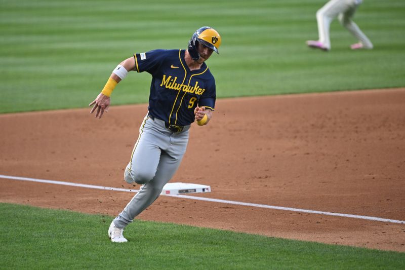 Aug 2, 2024; Washington, District of Columbia, USA; Milwaukee Brewers first baseman Jake Bauers (9) rounds third base and heads to home plate against the Washington Nationals during the second inning at Nationals Park. Mandatory Credit: Rafael Suanes-USA TODAY Sports