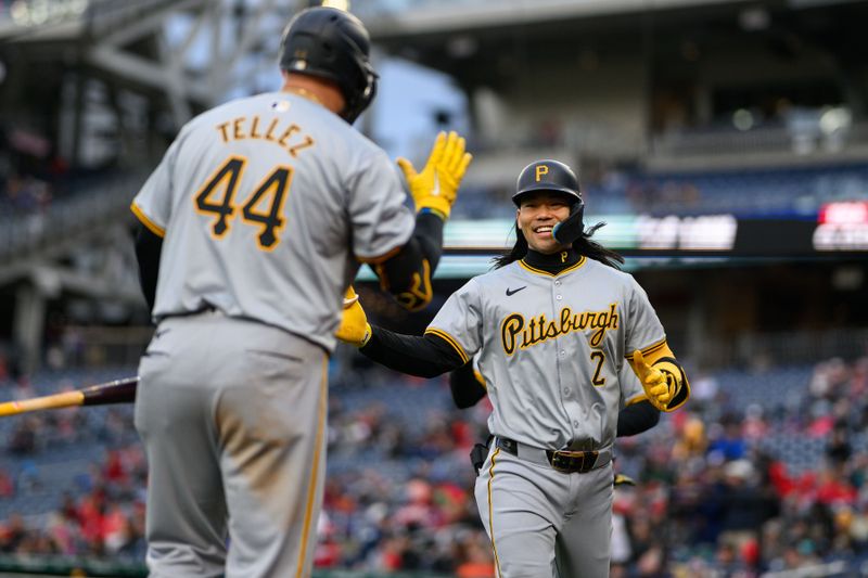 Apr 4, 2024; Washington, District of Columbia, USA; Pittsburgh Pirates designated hitter Connor Joe (2) celebrates after a home run during the fifth inning with first baseman Rowdy Tellez (44) against the Washington Nationals at Nationals Park. Mandatory Credit: Reggie Hildred-USA TODAY Sports