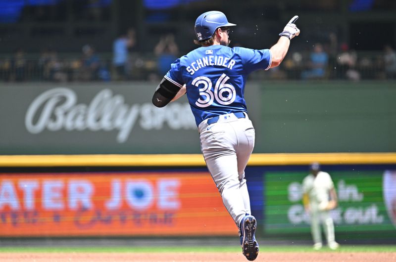 Jun 12, 2024; Milwaukee, Wisconsin, USA; Toronto Blue Jays outfielder Davis Schneider (36) rounds the bases after hitting a home run against the Milwaukee Brewers in the first inning at American Family Field. Mandatory Credit: Michael McLoone-USA TODAY Sports