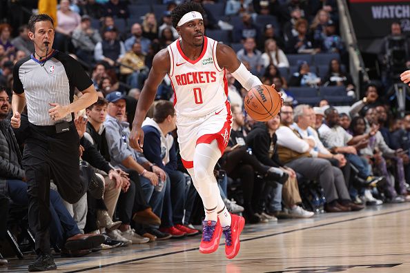 MEMPHIS, TN - DECEMBER 15:  Aaron Holiday #0 of the Houston Rockets dribbles the ball during the game against the Memphis Grizzlies on December 15, 2023 at FedExForum in Memphis, Tennessee. NOTE TO USER: User expressly acknowledges and agrees that, by downloading and or using this photograph, User is consenting to the terms and conditions of the Getty Images License Agreement. Mandatory Copyright Notice: Copyright 2023 NBAE (Photo by Joe Murphy/NBAE via Getty Images)