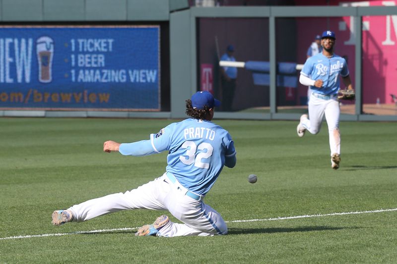 Jun 17, 2023; Kansas City, Missouri, USA; Kansas City Royals first baseman Nick Pratto (32) misses making a foul catch during the top of the ninth inning against the Los Angeles Angels at Kauffman Stadium. Mandatory Credit: Scott Sewell-USA TODAY Sports
