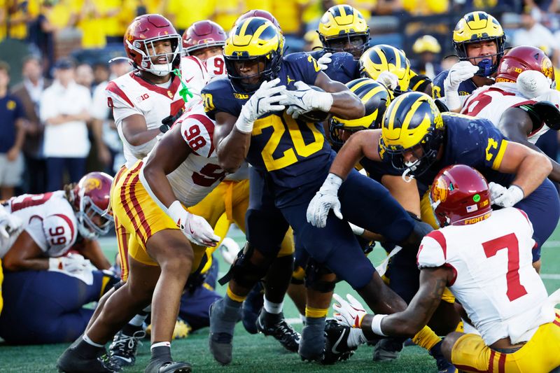 Sep 21, 2024; Ann Arbor, Michigan, USA;  Michigan Wolverines running back Kalel Mullings (20) rushes for a touchdown in the second half against the USC Trojans at Michigan Stadium. Mandatory Credit: Rick Osentoski-Imagn Images