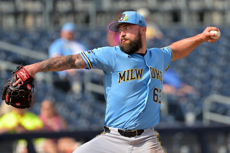Feb 23, 2026; Peoria, Arizona, USA;  Milwaukee Brewers pitcher Drew Rom (63) delivers to the plate against the San Diego Padres at Peoria Sports Complex. Mandatory Credit: Jayne Kamin-Oncea-Imagn Images
