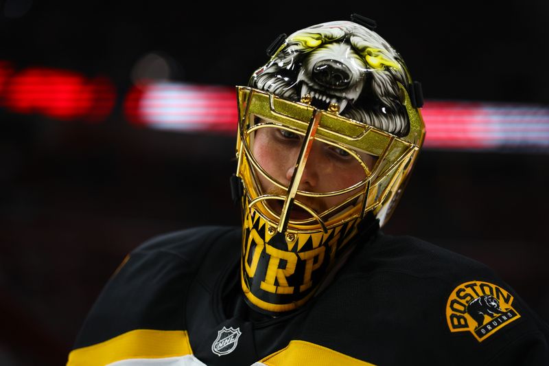 Oct 8, 2024; Sunrise, Florida, USA; Boston Bruins goaltender Joonas Korpisalo (70) looks on against the Florida Panthers during the second period at Amerant Bank Arena. Mandatory Credit: Sam Navarro-Imagn Images