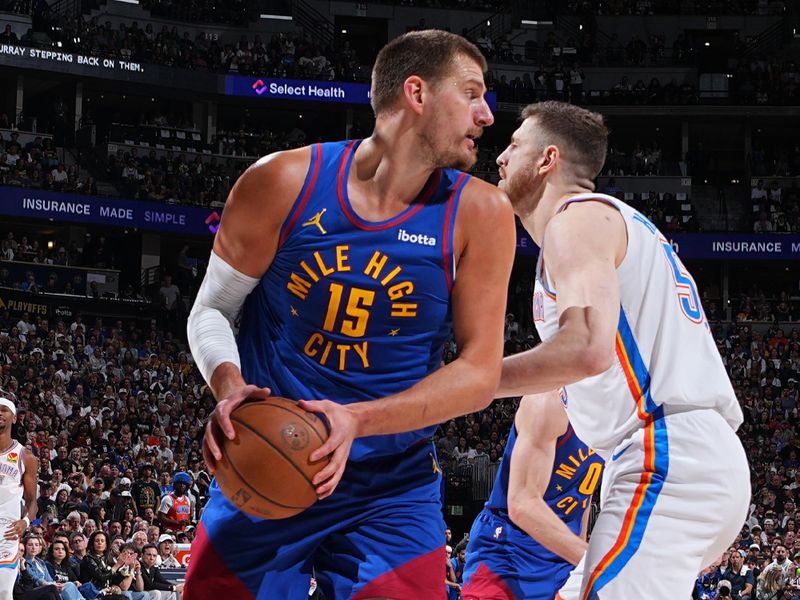 DENVER, CO - MAY 9:  Nikola Jokic #15 of the Denver Nuggets handles the ball during the game against the Oklahoma City Thunder  during Round Two Game Three of the 2025 NBA Playoffs on May 9, 2025 at Ball Arena in Denver, Colorado. NOTE TO USER: User expressly acknowledges and agrees that, by downloading and/or using this Photograph, user is consenting to the terms and conditions of the Getty Images License Agreement. Mandatory Copyright Notice: Copyright 2025 NBAE (Photo by Garrett Ellwood/NBAE via Getty Images)