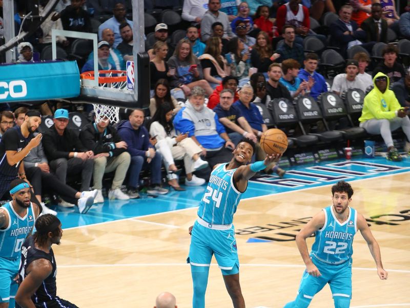 CHARLOTTE, NC - APRIL 5: Brandon Miller #24 of the Charlotte Hornets goes up for the rebound during the game against the Orlando Magic on April 5, 2024 at Spectrum Center in Charlotte, North Carolina. NOTE TO USER: User expressly acknowledges and agrees that, by downloading and or using this photograph, User is consenting to the terms and conditions of the Getty Images License Agreement. Mandatory Copyright Notice: Copyright 2024 NBAE (Photo by Kent Smith/NBAE via Getty Images)