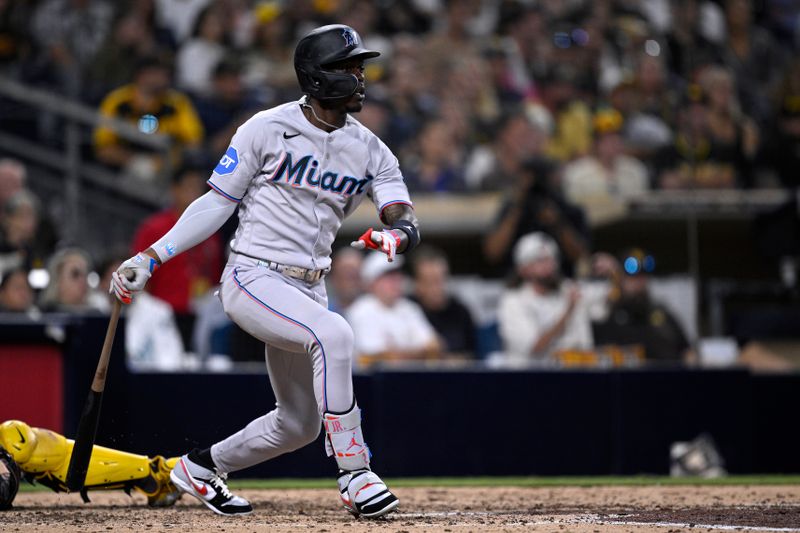 Aug 22, 2023; San Diego, California, USA; Miami Marlins center fielder Jazz Chisholm (2) hits a single against the San Diego Padres during the eighth inning at Petco Park. Mandatory Credit: Orlando Ramirez-USA TODAY Sports