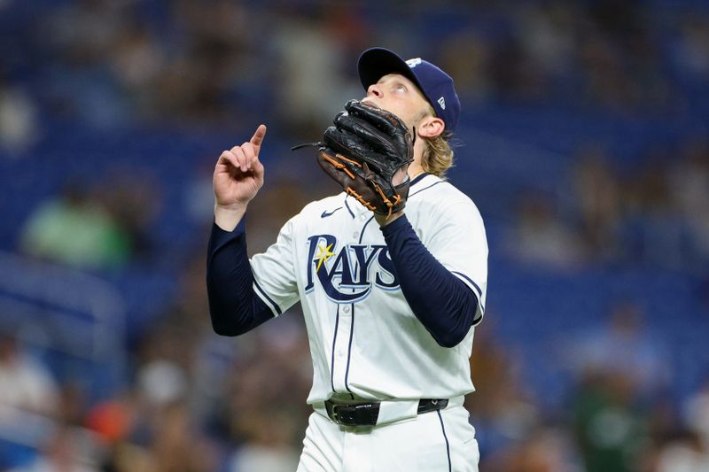 Aug 13, 2024; St. Petersburg, Florida, USA; Tampa Bay Rays pitcher Shane Baz (11) reacts after pitching against the Houston Astros in the seventh inning at Tropicana Field. Mandatory Credit: Nathan Ray Seebeck-USA TODAY Sports