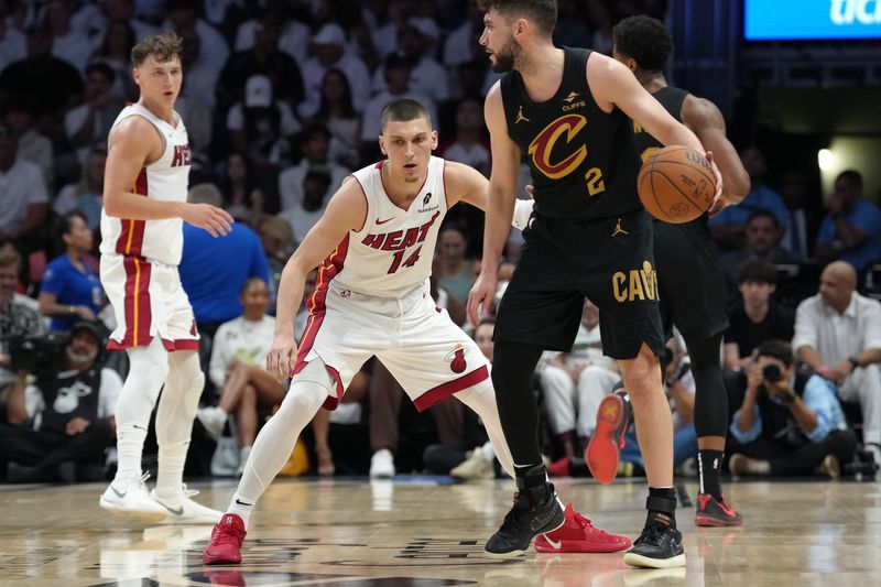 MIAMI, FL - APRIL 28: Tyler Herro #14 of the Miami Heat plays defense against Cleveland Cavaliers during round 1 game 4 of the 2025 NBA Playoffs on April 28, 2025 at Kaseya Center in Miami, Florida. NOTE TO USER: User expressly acknowledges and agrees that, by downloading and or using this Photograph, user is consenting to the terms and conditions of the Getty Images License Agreement. Mandatory Copyright Notice: Copyright 2025 NBAE (Photo by Eric Espada/NBAE via Getty Images)