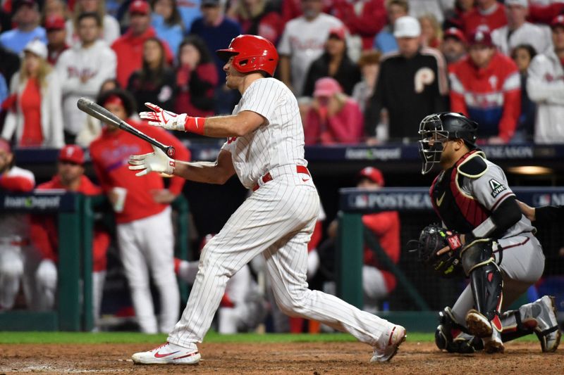 Oct 24, 2023; Philadelphia, Pennsylvania, USA; Philadelphia Phillies catcher J.T. Realmuto (10) strikes out to end the eighth inning against the Arizona Diamondbacks during game seven of the NLCS for the 2023 MLB playoffs at Citizens Bank Park. Mandatory Credit: Eric Hartline-USA TODAY Sports