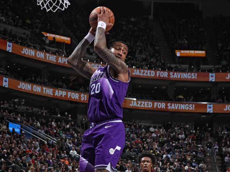 SALT LAKE CITY, UT - MARCH 4:  John Collins #20 of the Utah Jazz grabs a rebound during the game against the Washington Wizards on March 4, 2024 at vivint.SmartHome Arena in Salt Lake City, Utah. NOTE TO USER: User expressly acknowledges and agrees that, by downloading and or using this Photograph, User is consenting to the terms and conditions of the Getty Images License Agreement. Mandatory Copyright Notice: Copyright 2024 NBAE (Photo by Melissa Majchrzak/NBAE via Getty Images)