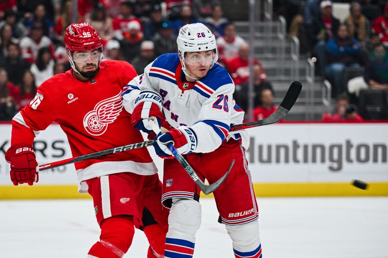 Apr 5, 2024; Detroit, Michigan, USA; New York Rangers left wing Jimmy Vesey (26) and Detroit Red Wings defenseman Jake Walman (96) battle for the puck during the first period at Little Caesars Arena. Mandatory Credit: Tim Fuller-USA TODAY Sports