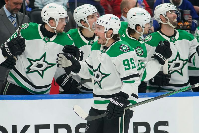 Jan 14, 2025; Toronto, Ontario, CAN; Dallas Stars forward Matt Duchene (95) celebrates his goal against the Toronto Maple Leafs during the third period at Scotiabank Arena. Mandatory Credit: John E. Sokolowski-Imagn Images