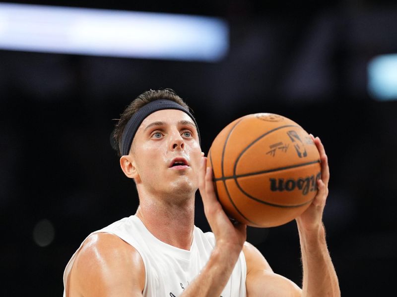 SAN ANTONIO, TX - NOVEMBER 2: Zach Collins #23 of the San Antonio Spurs warms up before the game against the Minnesota Timberwolves on November 2, 2024 at the Frost Bank Center in San Antonio, Texas. NOTE TO USER: User expressly acknowledges and agrees that, by downloading and or using this photograph, user is consenting to the terms and conditions of the Getty Images License Agreement. Mandatory Copyright Notice: Copyright 2024 NBAE (Photos by Cooper Neill/NBAE via Getty Images)