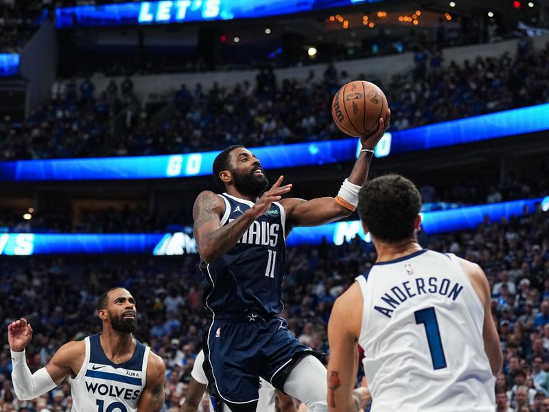 DALLAS, TX - MAY 26: Kyrie Irving #11 of the Dallas Mavericks handles the ball during the game  against the Minnesota Timberwolves during Game 3 of the Western Conference Finals of the 2024 NBA Playoffs on May 26, 2024 at the American Airlines Center in Dallas, Texas. NOTE TO USER: User expressly acknowledges and agrees that, by downloading and or using this photograph, User is consenting to the terms and conditions of the Getty Images License Agreement. Mandatory Copyright Notice: Copyright 2024 NBAE (Photo by Glenn James/NBAE via Getty Images)