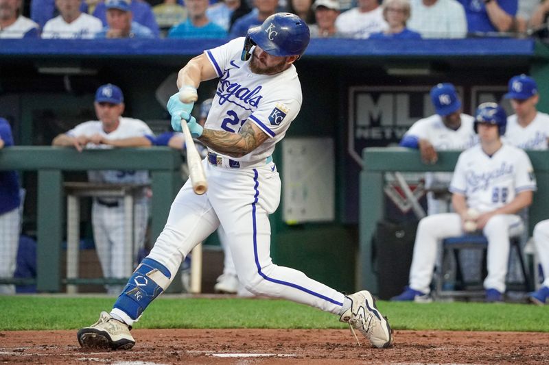 Aug 16, 2023; Kansas City, Missouri, USA; Kansas City Royals designated hitter Kyle Isbel (28) hits a one run sacrifice against the Seattle Mariners in the second inning at Kauffman Stadium. Mandatory Credit: Denny Medley-USA TODAY Sports