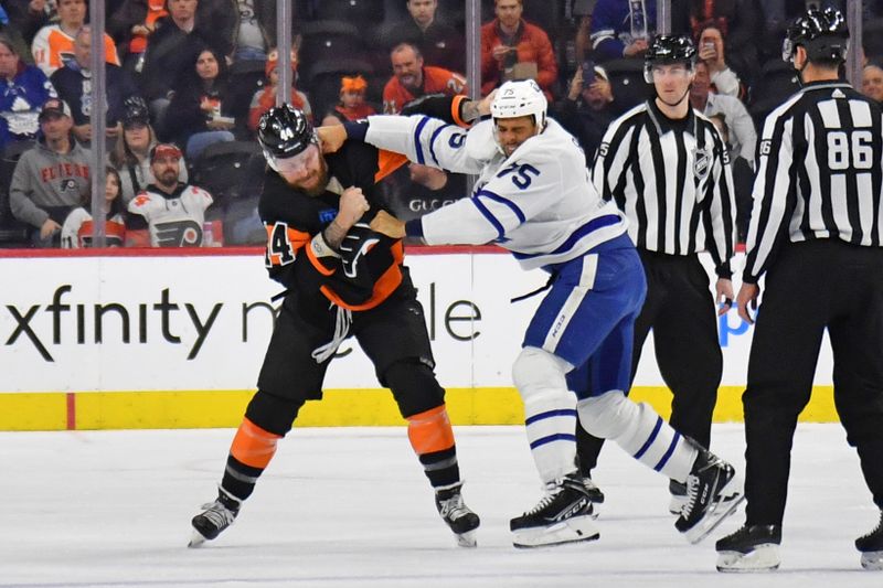 Mar 19, 2024; Philadelphia, Pennsylvania, USA; Philadelphia Flyers left wing Nicolas Deslauriers (44) and Toronto Maple Leafs right wing Ryan Reaves (75) fight during the first period at Wells Fargo Center. Mandatory Credit: Eric Hartline-USA TODAY Sports