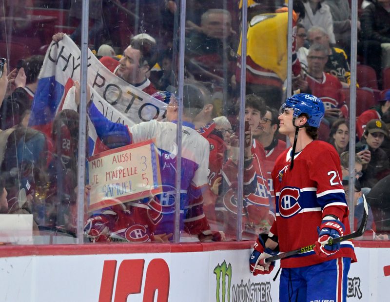 Mar 14, 2024; Montreal, Quebec, CAN; Montreal Canadiens forward Juraj Slafkovsky (20) interacts with fans during the warmup period before the game against the Boston Bruins at the Bell Centre. Mandatory Credit: Eric Bolte-USA TODAY Sports