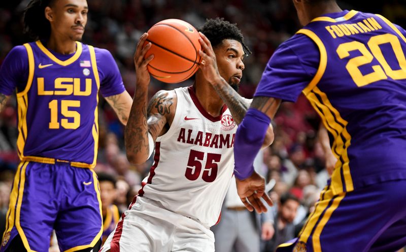 Jan 27, 2024; Tuscaloosa, Alabama, USA;  Alabama guard Aaron Estrada cuts between LSU forward Tyrell Ward (15) and LSU forward Derek Fountain (20) at Coleman Coliseum. Mandatory Credit: Gary Cosby Jr.-USA TODAY Sports