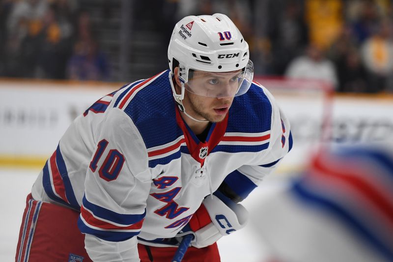 Dec 2, 2023; Nashville, Tennessee, USA; New York Rangers left wing Artemi Panarin (10) waits for a face off against the Nashville Predators during the second period at Bridgestone Arena. Mandatory Credit: Christopher Hanewinckel-USA TODAY Sports