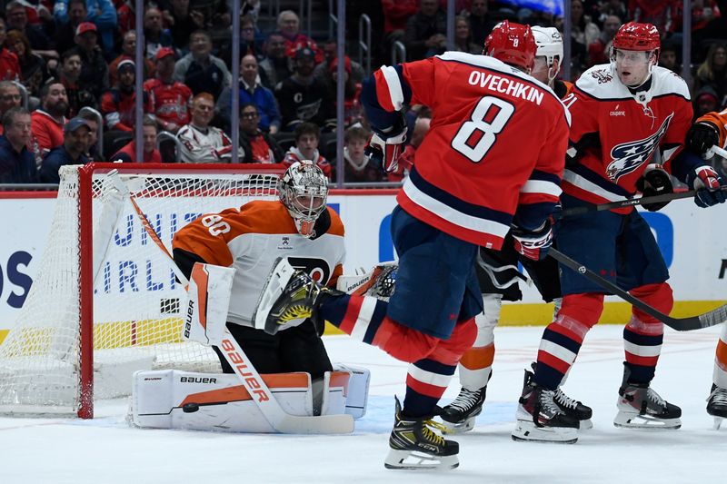 Feb 25, 2026; Washington, District of Columbia, USA; Philadelphia Flyers goaltender Dan Vladar (80) makes a save against a shot by Washington Capitals left wing Alex Ovechkin (8) during the first period at Capital One Arena. Mandatory Credit: Hannah Foslien-Imagn Images