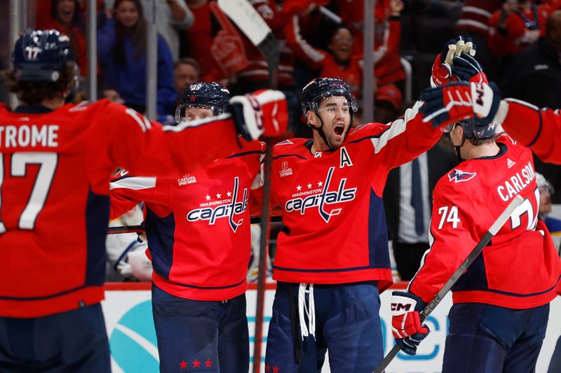 Nov 22, 2023; Washington, District of Columbia, USA; Washington Capitals right wing Tom Wilson (43) celebrates with teammates after scoring the game-tying goal against the Buffalo Sabres in the final minutes of the third period at Capital One Arena. Mandatory Credit: Geoff Burke-USA TODAY Sports