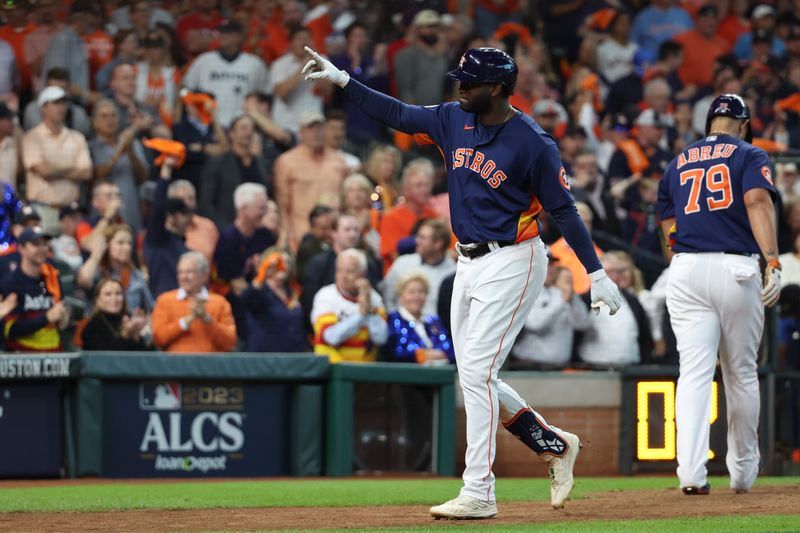 Oct 16, 2023; Houston, Texas, USA; Houston Astros left fielder Yordan Alvarez (44) celebrates after hitting a home run in the eighth inning against the Texas Rangers during game two of the ALCS for the 2023 MLB playoffs at Minute Maid Park. Mandatory Credit: Thomas Shea-USA TODAY Sports