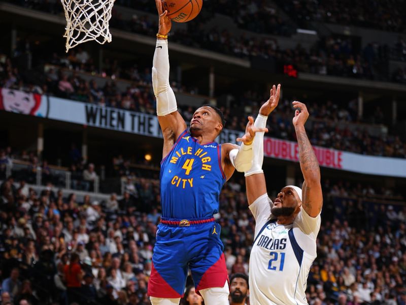 DENVER, CO - NOVEMBER 22: Russell Westbrook #4 of the Denver Nuggets drives to the basket during the game against the Dallas Mavericks during the Emirates NBA Cup game on November 22, 2024 at Ball Arena in Denver, Colorado. NOTE TO USER: User expressly acknowledges and agrees that, by downloading and/or using this Photograph, user is consenting to the terms and conditions of the Getty Images License Agreement. Mandatory Copyright Notice: Copyright 2024 NBAE (Photo by Garrett Ellwood/NBAE via Getty Images)