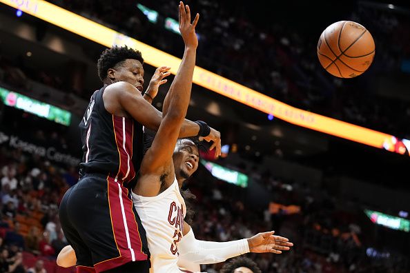 MIAMI, FLORIDA - DECEMBER 08: Kyle Lowry #7 of the Miami Heat fouls Isaac Okoro #35 of the Cleveland Cavaliers during the first quarter at Kaseya Center on December 08, 2023 in Miami, Florida. NOTE TO USER: User expressly acknowledges and agrees that, by downloading and or using this photograph, User is consenting to the terms and condtions of the Getty Images License Agreement.  (Photo by Rich Storry/Getty Images)