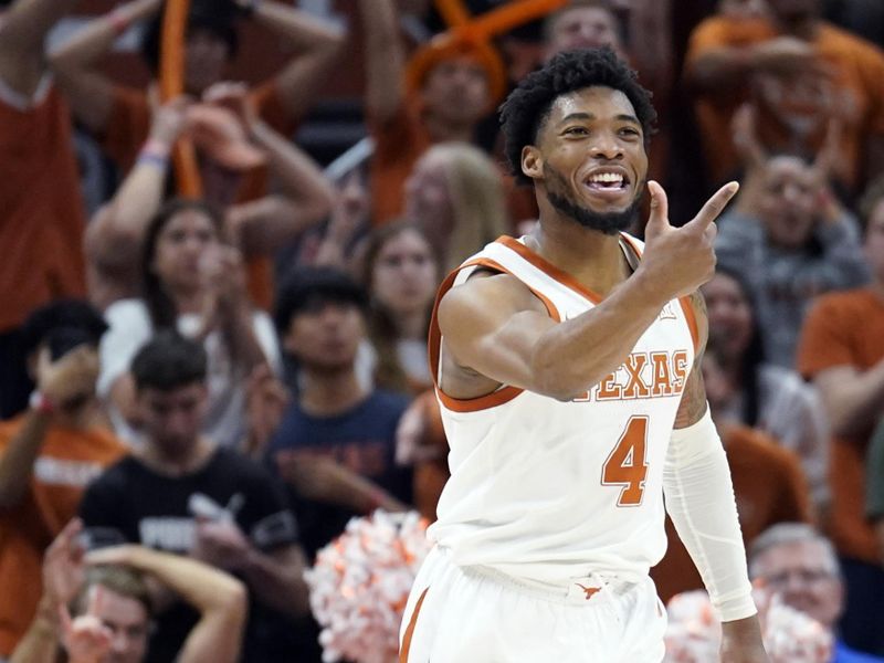 Mar 4, 2023; Austin, Texas, USA; Texas Longhorns guard Tyrese Hunter (4) reacts after scoring a three point basket during the second half against the Kansas Jayhawks at Moody Center. Mandatory Credit: Scott Wachter-USA TODAY Sports