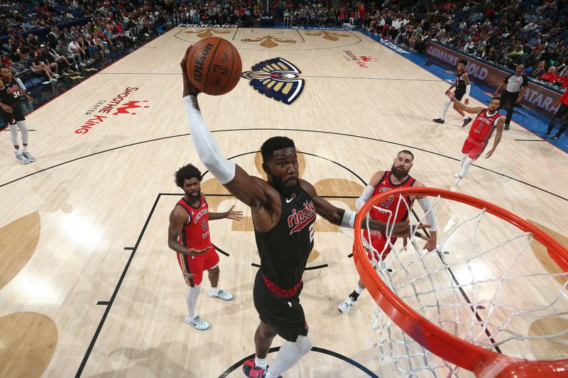 NEW ORLEANS, LA - MARCH 16: Deandre Ayton #2 of the Portland Trail Blazers drives to the basket during the game against the New Orleans Pelicans on March 16, 2024 at the Smoothie King Center in New Orleans, Louisiana. NOTE TO USER: User expressly acknowledges and agrees that, by downloading and or using this Photograph, user is consenting to the terms and conditions of the Getty Images License Agreement. Mandatory Copyright Notice: Copyright 2024 NBAE (Photo by Layne Murdoch Jr./NBAE via Getty Images)