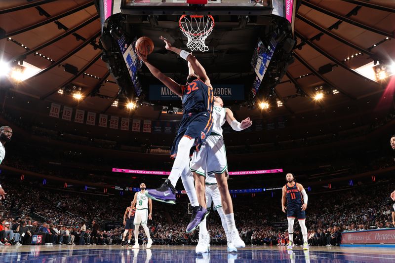NEW YORK, NY - APRIL 8:  Karl-Anthony Towns #32 of the New York Knicks drives to the basket during the game against the Boston Celtics on April 8, 2025 at Madison Square Garden in New York City, New York.  NOTE TO USER: User expressly acknowledges and agrees that, by downloading and or using this photograph, User is consenting to the terms and conditions of the Getty Images License Agreement. Mandatory Copyright Notice: Copyright 2025 NBAE  (Photo by Nathaniel S. Butler/NBAE via Getty Images)