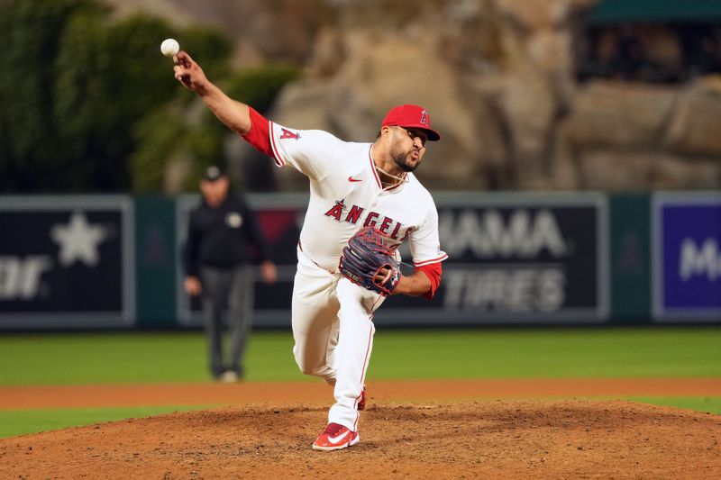 Jun 17, 2024; Anaheim, California, USA; Los Angeles Angels relief pitcher Carlos Estevez (53) throws in the ninth inning against the Milwaukee Brewers at Angel Stadium. Mandatory Credit: Kirby Lee-USA TODAY Sports