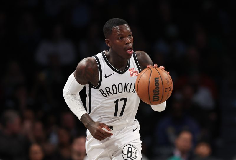 NEW YORK, NEW YORK - NOVEMBER 13: Dennis Schroder #17 of the Brooklyn Nets drives against the Boston Celtics during the first quarter at Barclays Center on November 13, 2024 in New York City. NOTE TO USER: User expressly acknowledges and agrees that, by downloading and or using this photograph, User is consenting to the terms and conditions of the Getty Images License Agreement.  (Photo by Sarah Stier/Getty Images)