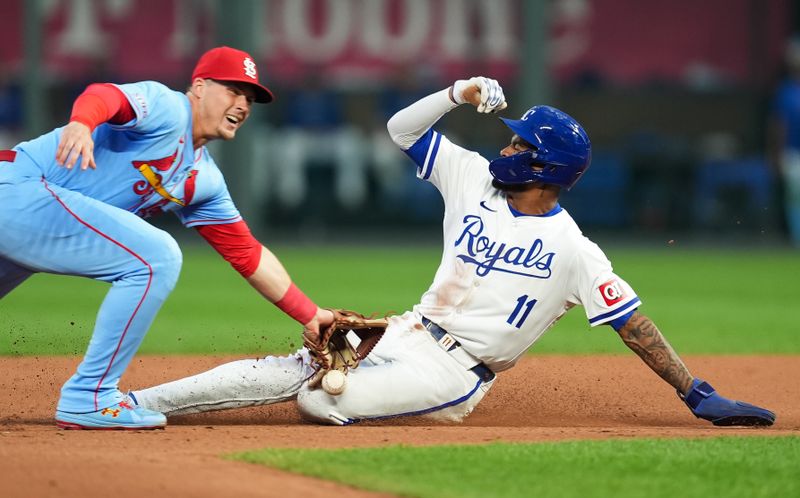 Aug 10, 2024; Kansas City, Missouri, USA; Kansas City Royals second baseman Maikel Garcia (11) steals second base against St. Louis Cardinals second baseman Nolan Gorman (16) during the seventh inning at Kauffman Stadium. Mandatory Credit: Jay Biggerstaff-USA TODAY Sports